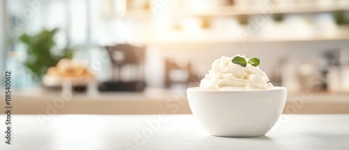 Wallpaper Mural A close-up of a bowl of creamy whipped cream garnished with mint leaves, set against a bright kitchen background. Torontodigital.ca