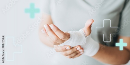 Obraz na plátně Woman with gauze bandage wrapped around her hand