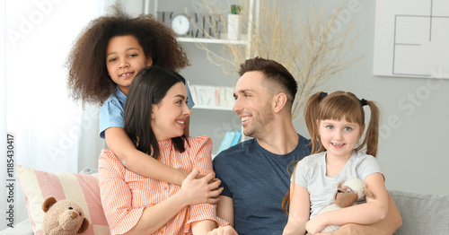 Happy couple with little ad...