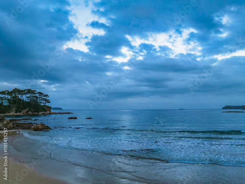 Cloudy Sunrise Seascape at Denhams Beach photo