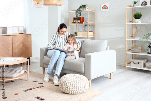 Young woman reading story t...