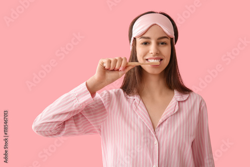 Young woman in pajamas and ...