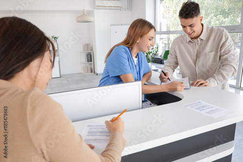 Female medical intern worki...