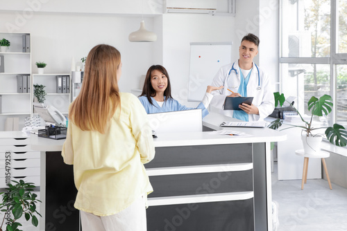 Medical intern working with...