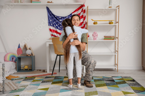 Female soldier with her dau...