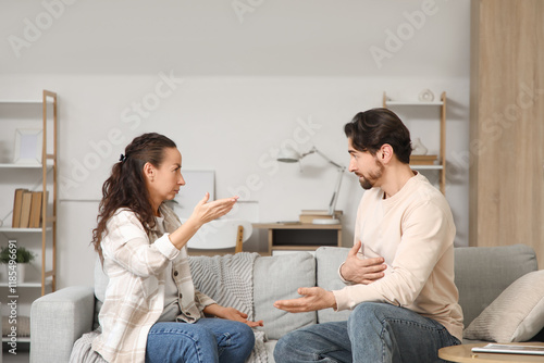 Unhappy couple quarreling o...