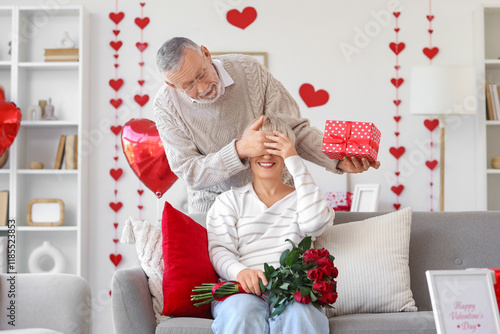 Mature man greeting his hap...
