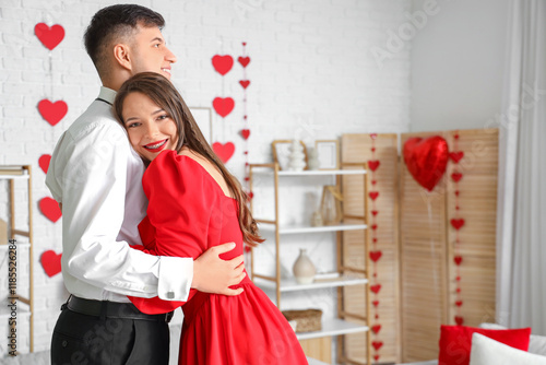 Young couple in love huggin...