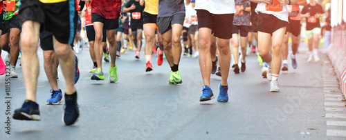 Marathon Running In The Light Of Morning, People Running On City Road Detail On Legs, Step, Walk And Outdoor Exercise Activities Concept.