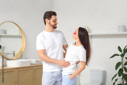 Young couple in bathroom ap...