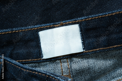 Foto White rectangular label inside blue jeans waistband