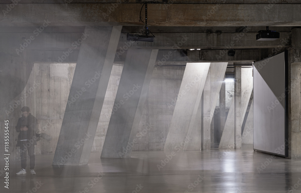View of Concrete pillars inside Blavatnik Building of Tate Modern Switch House extension. Interior at Tate modern its distinctive and lattice brickwork. Angular structure, Space for text.