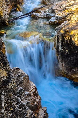 Beautiful clear water flowing through Marble Canyon and travelling over waterfalls 