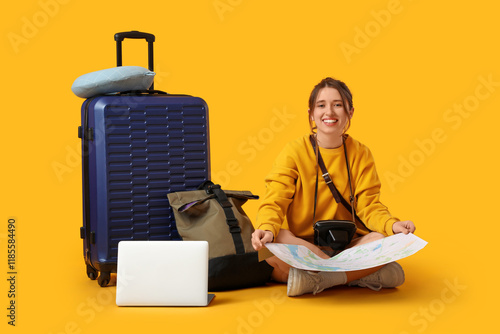 Female traveler with map an...
