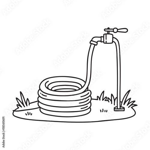 A coiled hose on the lawn connected to an outdoor faucet photo