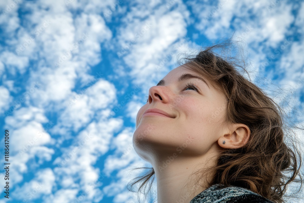 Captivating Portrait of a Woman Gazing Upwards Towards the Sky, Embracing Nature and Outdoor Lifestyle Captivating Portrait of a Woman Gazing Upwards Towards the Sky, Embracing Nature and Outdoor Lifestyle