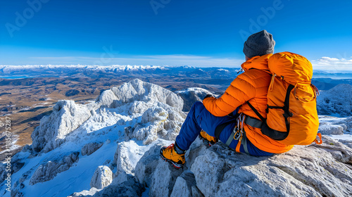 A backpack-wielding mountain climber observing snow-capped peaks, cutout