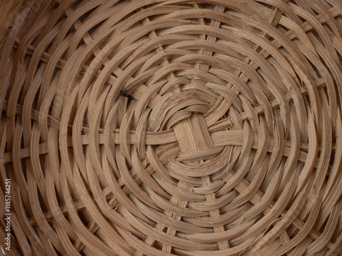 container made of rattan with a white background, usually for kitchen spices. seen from above.