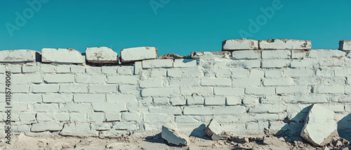 Urban textured banner template with light brick wall and clear sky background photo