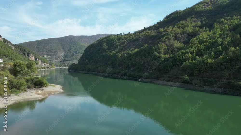 Cinematic Aerial View of Albania’s Koman Lake Fjords and Serene Waters Cinematic Aerial View of Albania’s Koman Lake Fjords and Serene Waters
