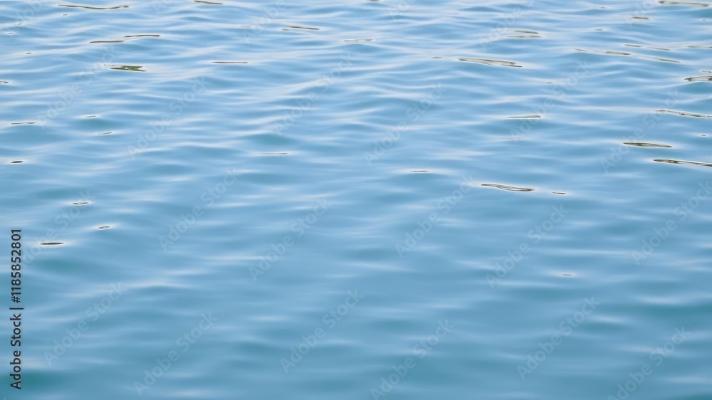 *Water ripples on a still lake with a subtle hint of turquoise, photics, disturbance, outdoors *Water ripples on a still lake with a subtle hint of turquoise, photics, disturbance, outdoors
