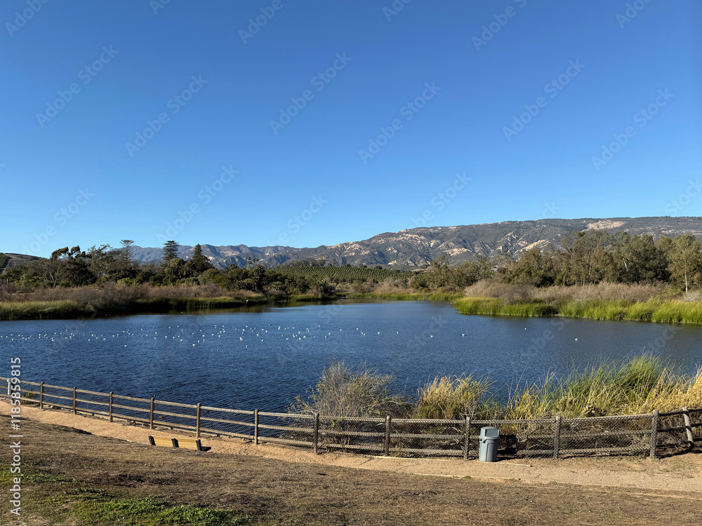 Tranquil Lake Carneros in Goleta with Santa Ynez mountains in the back on a warm southern Caliornia winter day Tranquil Lake Carneros in Goleta with Santa Ynez mountains in the back on a warm southern Caliornia winter day