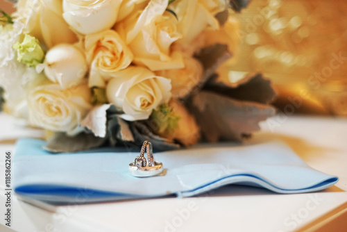 wedding rings and rose