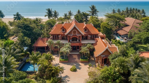 Wallpaper Mural Serene Coastal Mansion Surrounded by Lush Greenery and Ocean Views Torontodigital.ca