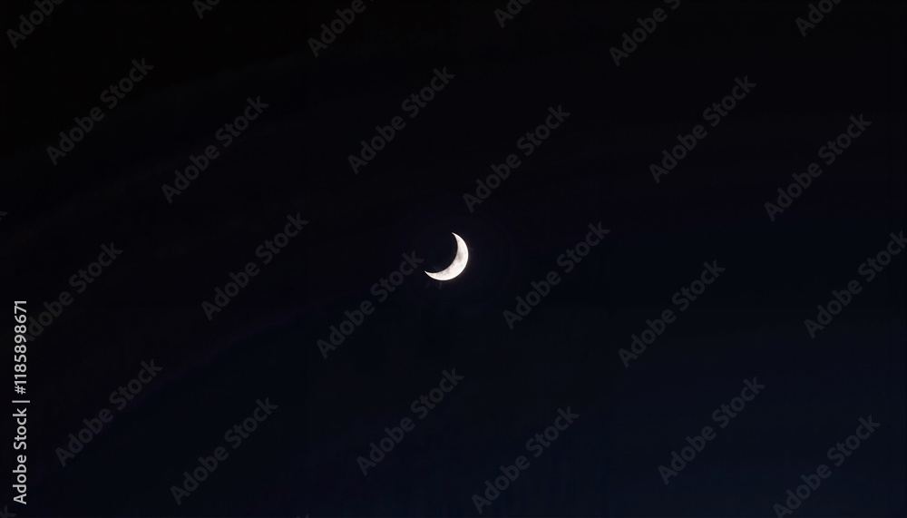 Crescent moon in a dark night sky Crescent moon in a dark night sky