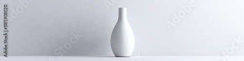 A stylish white cosmetic bottle with a matte finish and sleek lines, displayed on a white background. photo