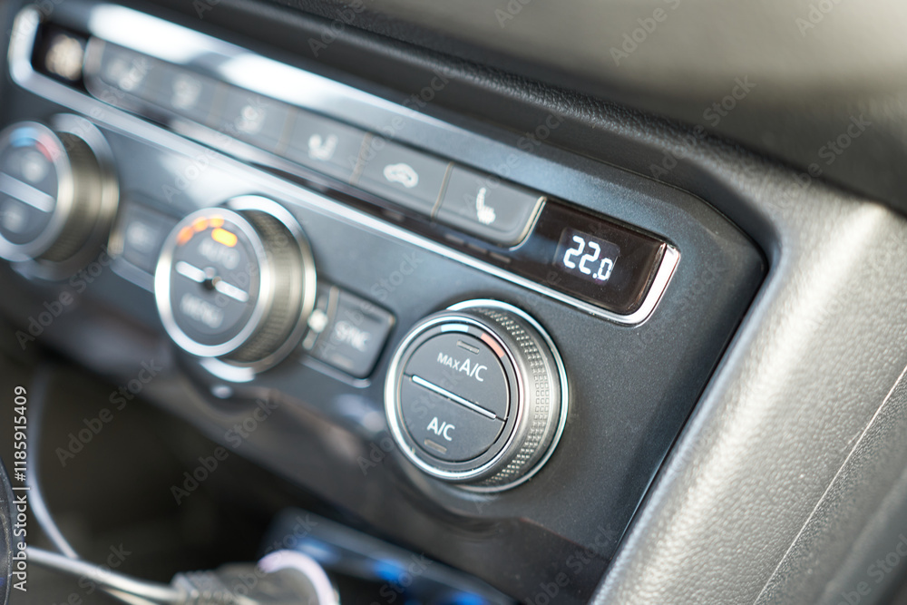 Closeup of the air conditioning and control panel in a modern car Closeup of the air conditioning and control panel in a modern car