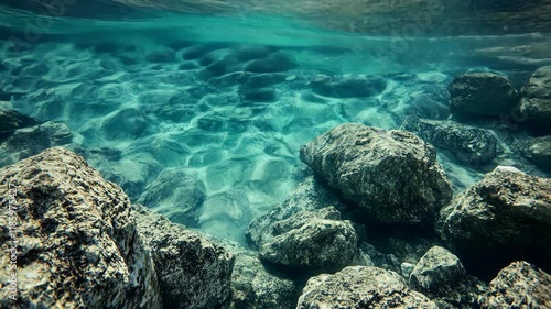 Wallpaper Mural Underwater serenity reveals smooth rocks and sparkling water in clear ocean depths Torontodigital.ca