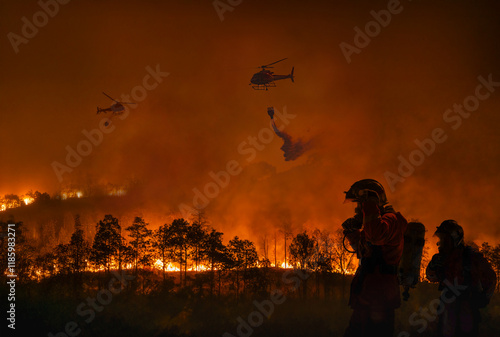 Quadro em tela Fire fighting helicopter carry water bucket to extinguish the forest fire