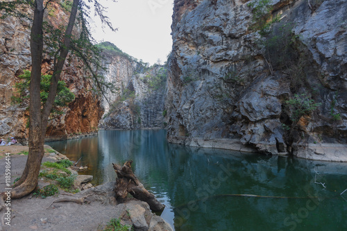 Khao Ngu Stone Park is located at Mueang District, Ratchaburi, Used to be an important blasting and crushing site in Thailand, a small limestone from the Permian period of the Ratchaburi Rock Group photo