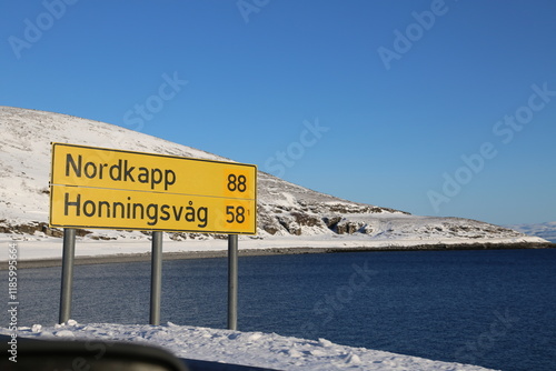 Street sign Nordkapp and Honningsvåg in Norway in Winter