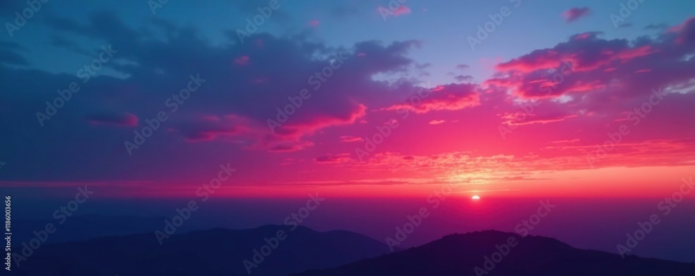 Fototapeta premium Gradual transition from blue to red across a sky at dusk, nature, gradient