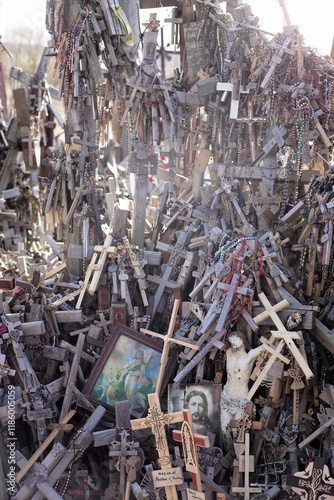 Thousands of religious symbols, crucifixes, rosaries, rosary and catholic crosses with Jesus, Hill of Crosses, Kryžių kalnas,  is a site of pilgrimage north of of Šiauliai, Lithuania