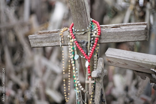 Thousands of religious symbols, crucifixes, rosaries, rosary and catholic crosses with Jesus, Hill of Crosses, Kryžių kalnas,  is a site of pilgrimage north of of Šiauliai, Lithuania