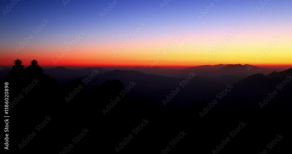 Time lapse of sunrise over Laojun Mountain Taoist Temple. Laojun Mountain scenic spot in Luoyang is said to be the place where Li Er (Lao Zi), the first ancestor of Taoism, retired and cultivated. Time lapse of sunrise over Laojun Mountain Taoist Temple. Laojun Mountain scenic spot in Luoyang is said to be the place where Li Er (Lao Zi), the first ancestor of Taoism, retired and cultivated.