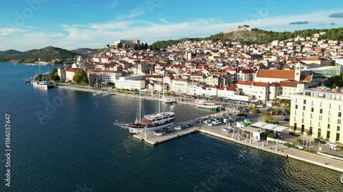 Wallpaper Mural Drone flight towards a small croatian city with a harbour in the foreground. Torontodigital.ca