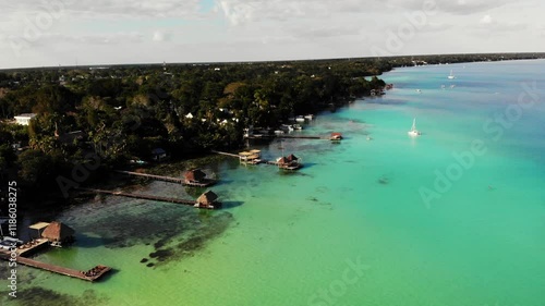 Aerial Footage of Bacalar Lagoon and Lush Surrounding Forest – Stunning Views of the Crystal-Clear Waters and Coastal Area photo