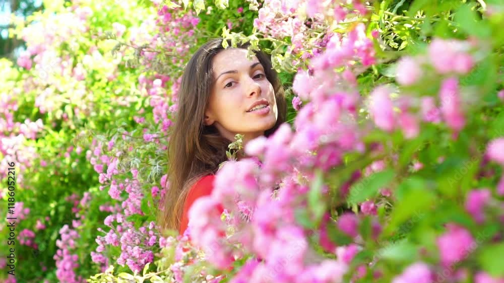Beautiful sensual romantic woman in spring blooming garden. Pretty woman in spring cherry blossom park, springtime. Young woman near blossoming spring tree. Fashion spring look. Beautiful sensual romantic woman in spring blooming garden. Pretty woman in spring cherry blossom park, springtime. Young woman near blossoming spring tree. Fashion spring look.