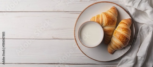 Cup of milk and crescent ro...