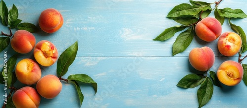 Ripe peaches and green leav...