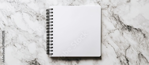 Blank sketchbook on a marbl...