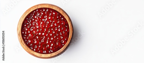 Wooden bowl filled with red...