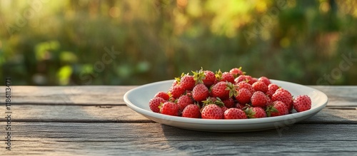 Ripe red wild strawberries ...