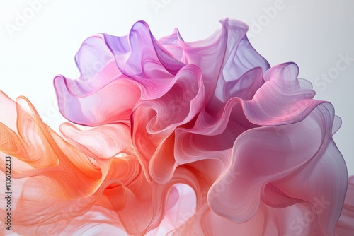 Abstract close-up of pink and orange fabric ruffles in soft focus photo