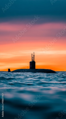 A vintage World War era submarine cruising near the ocean surface its periscope and conning tower visible under a dramatic sunset sky  photo