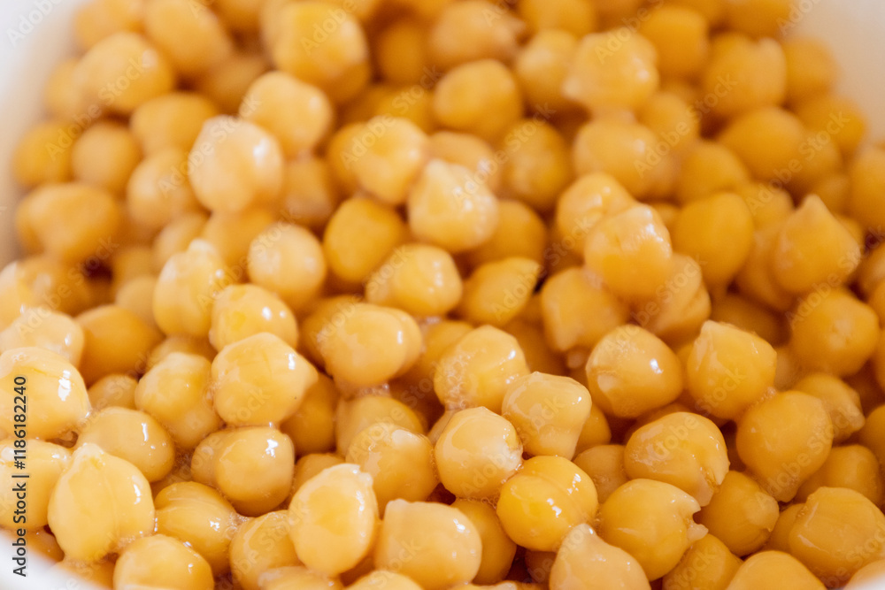 Cooked Chickpeas in a White Bowl Close-Up Cooked Chickpeas in a White Bowl Close-Up